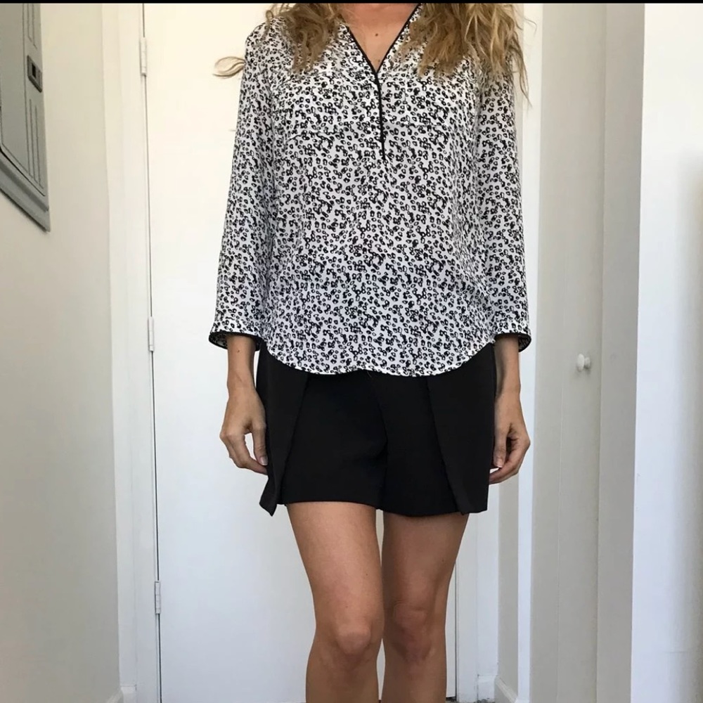 Half button down black and white shirt